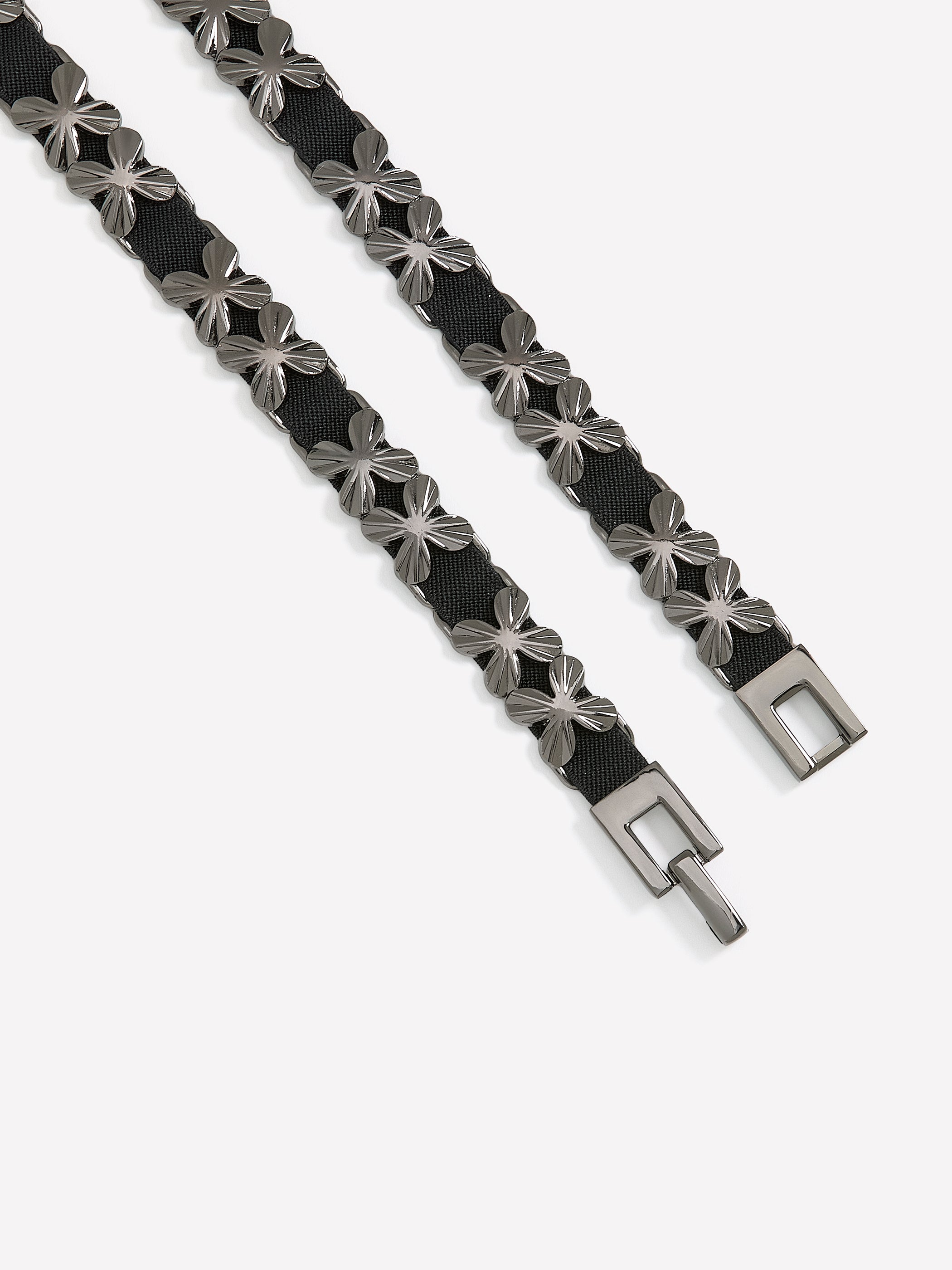 Ceinture extensible noire avec maillons floraux métalliques 