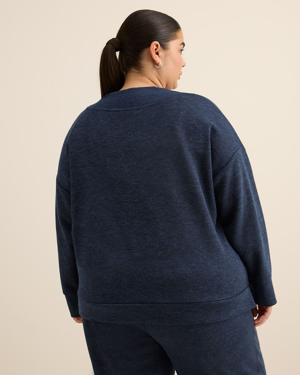 Haut à col en V et manches longues avec épaules basses