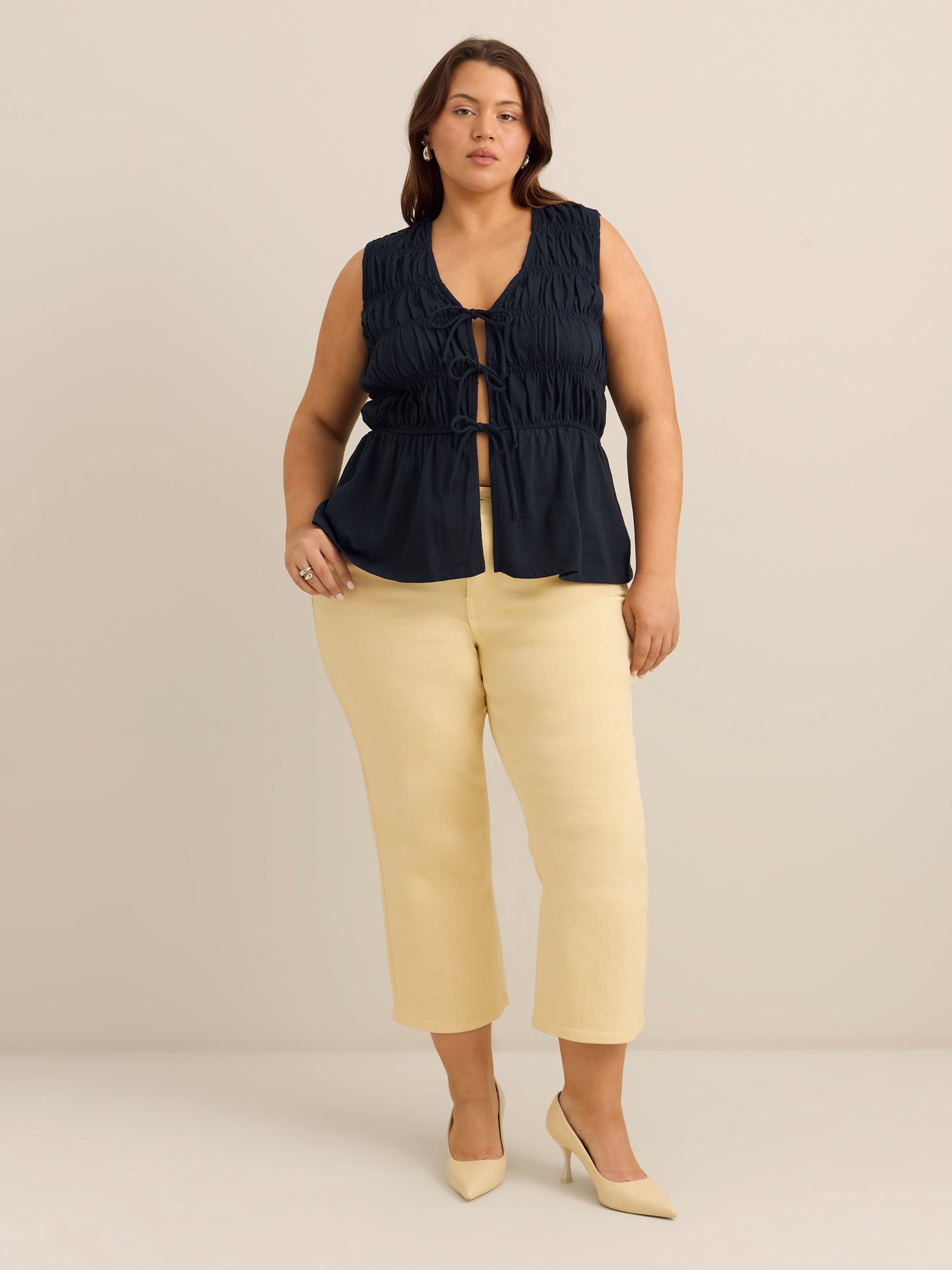 Flared Sleeveless V-Neck Tie-Front Smocked Blouse - Addition Elle