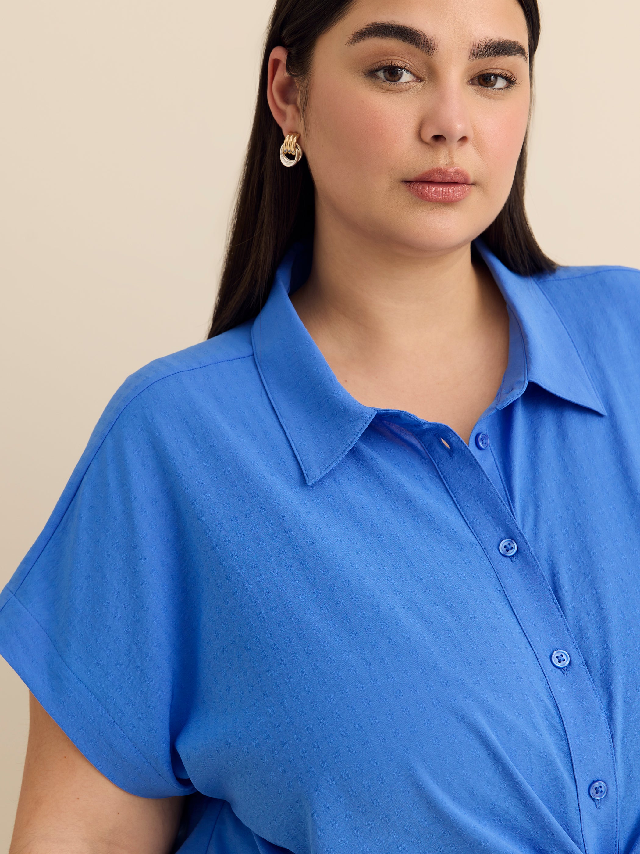 Blouse boutonnée avec noeud à la taille