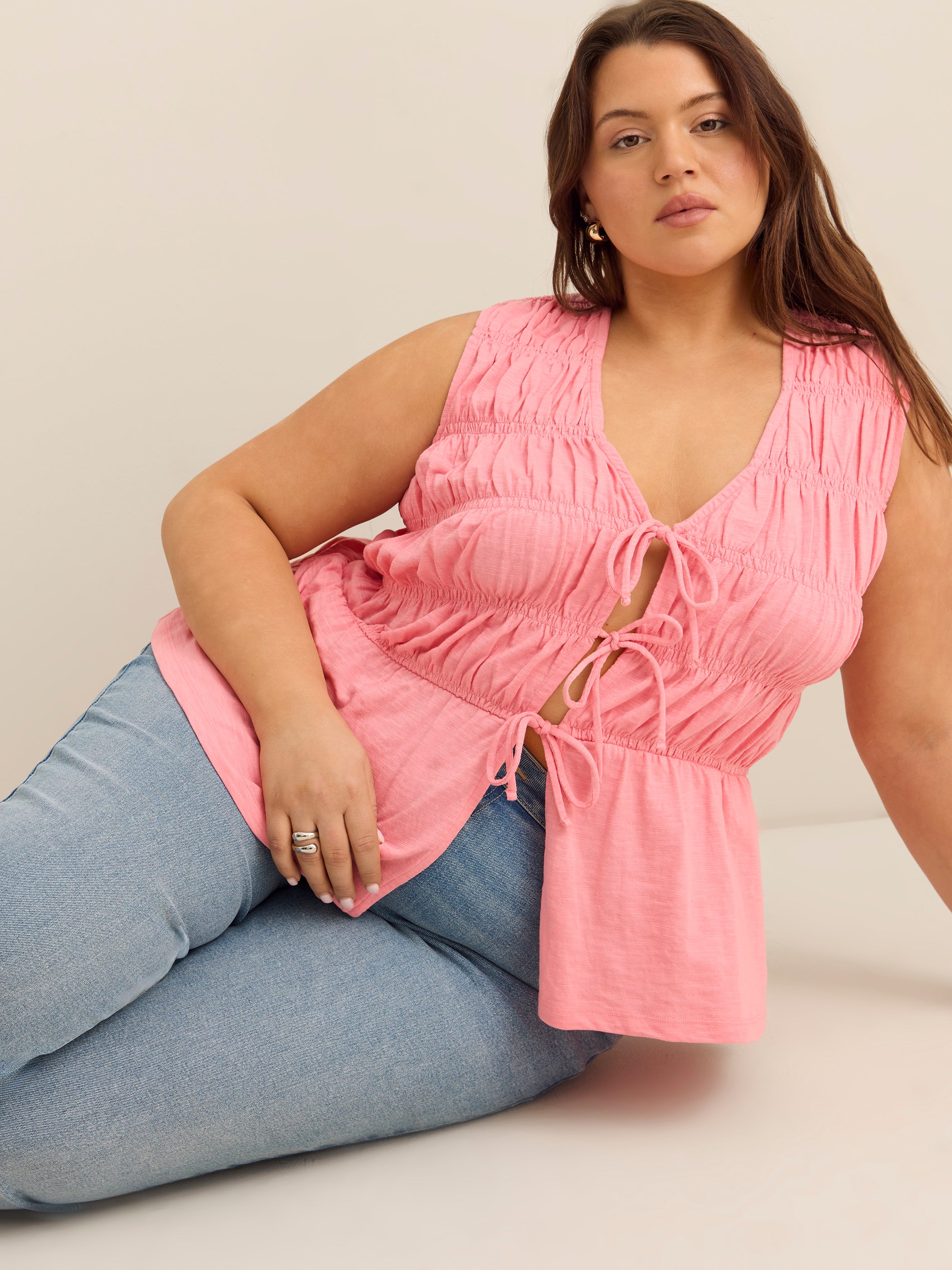 Flared Sleeveless V-Neck Tie-Front Smocked Blouse - Addition Elle