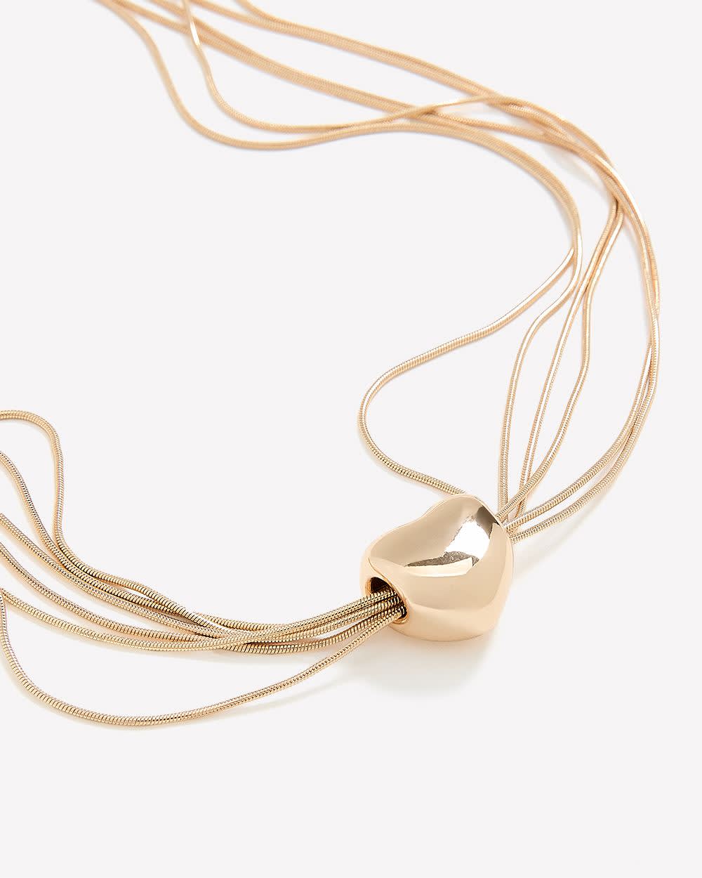 Collier à chaînes multiples dorées avec pendentif en coeur gonflé