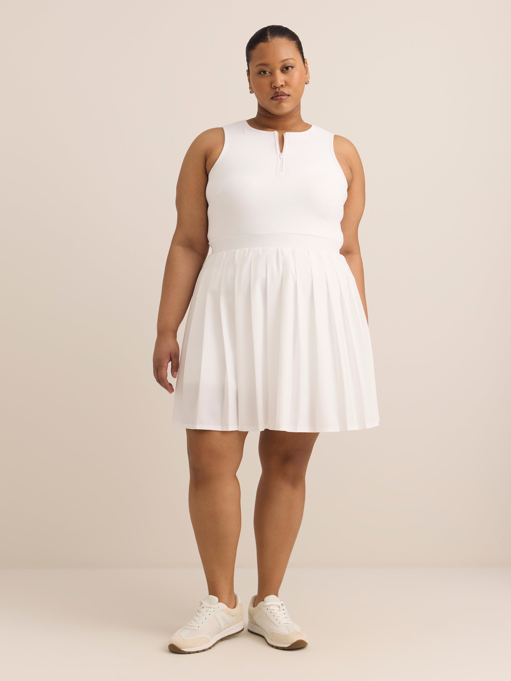 Active Zone plus size pleated tennis dress with open back – Penningtons