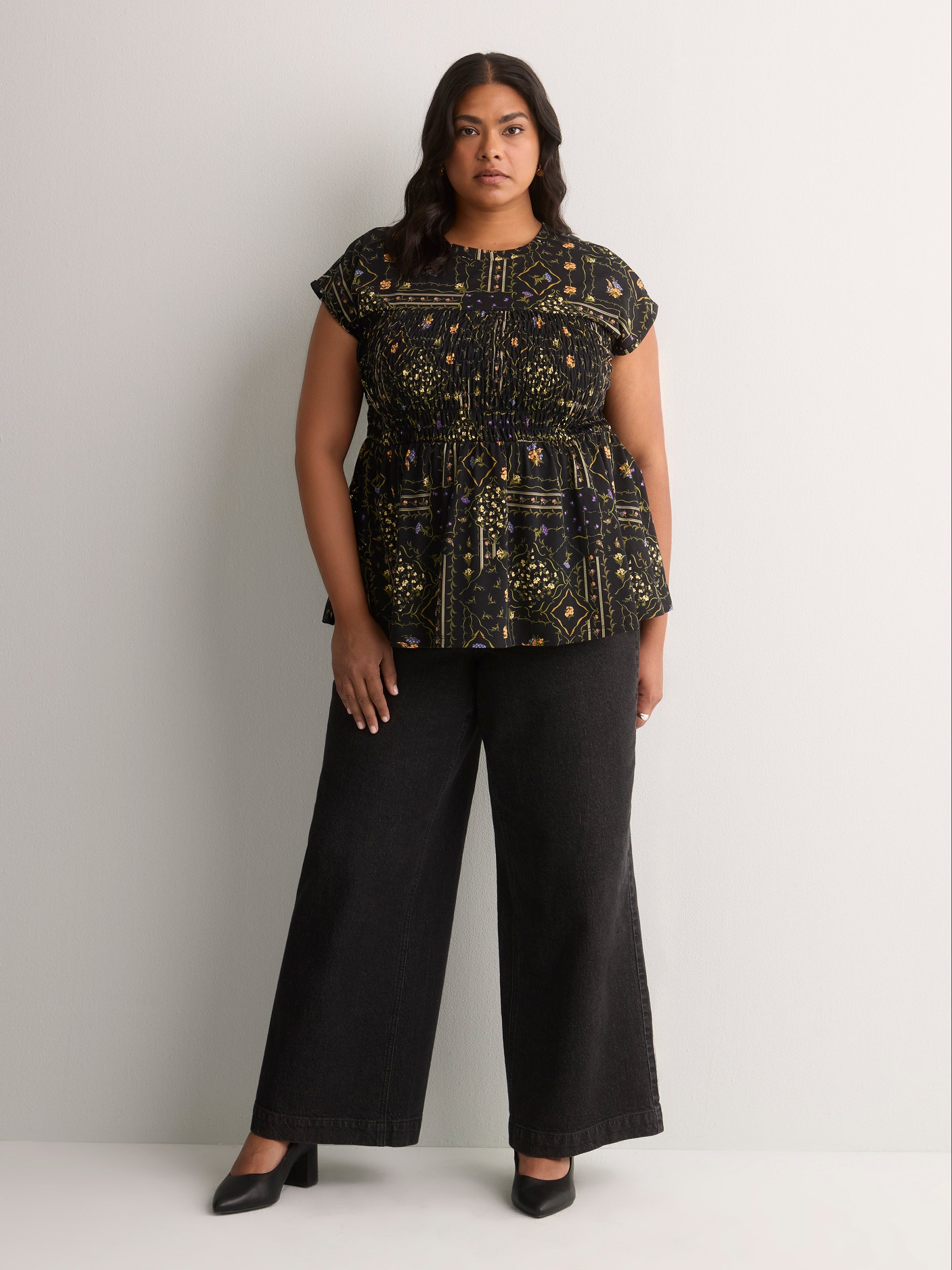Extended Sleeve Smocked Knit Blouse