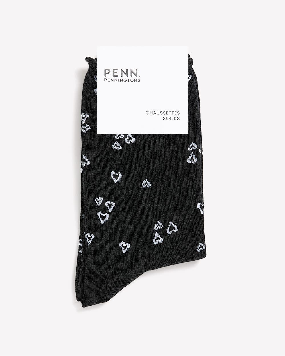Chaussettes noires à motif de coeurs