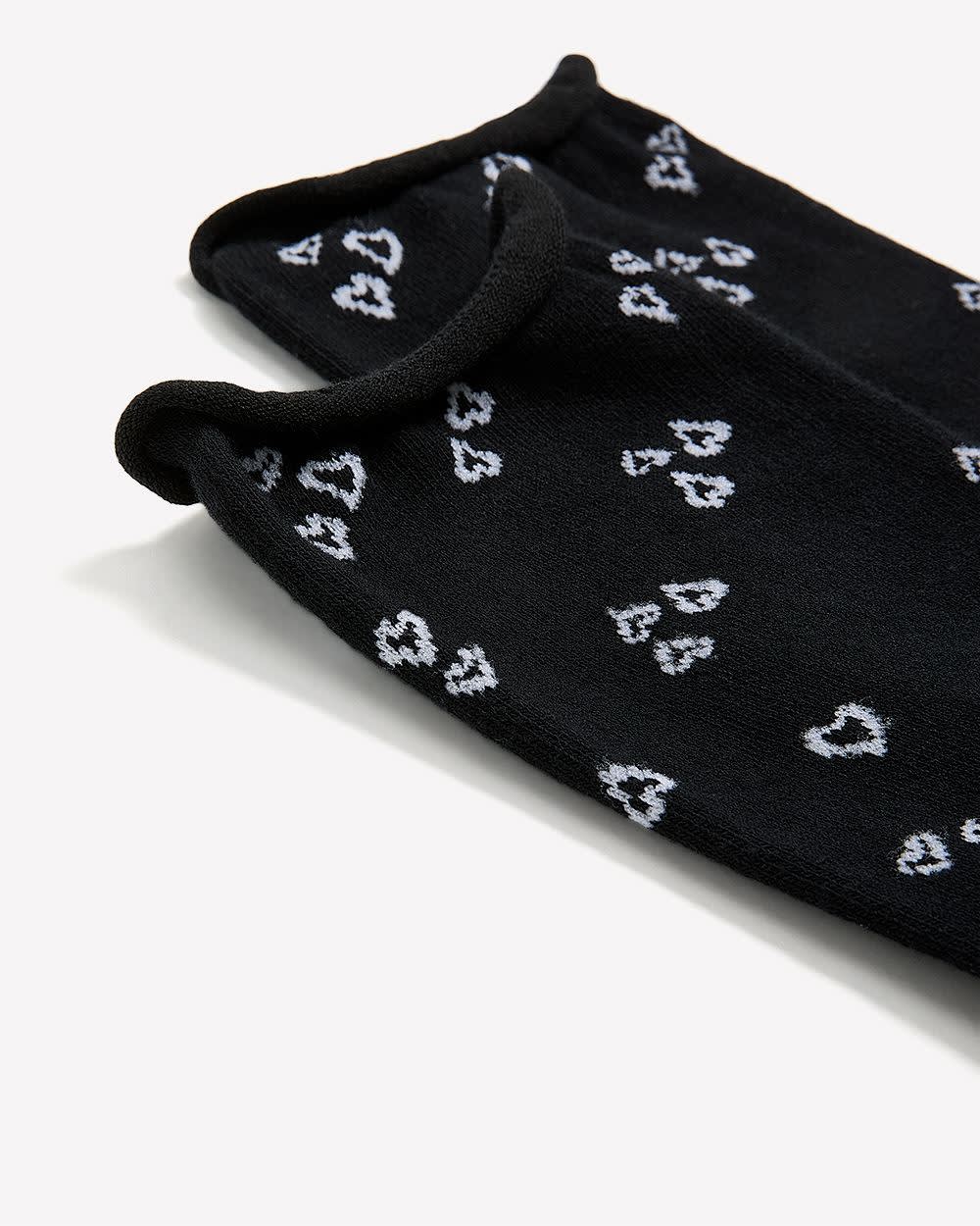 Chaussettes noires à motif de coeurs