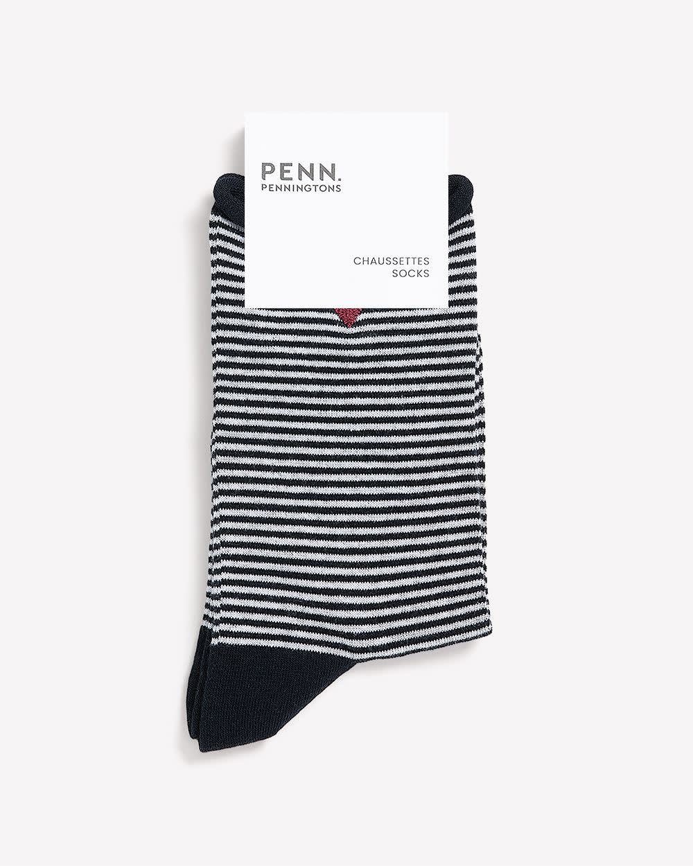Chaussettes à rayures noir et blanc avec rebord roulé et petit coeur