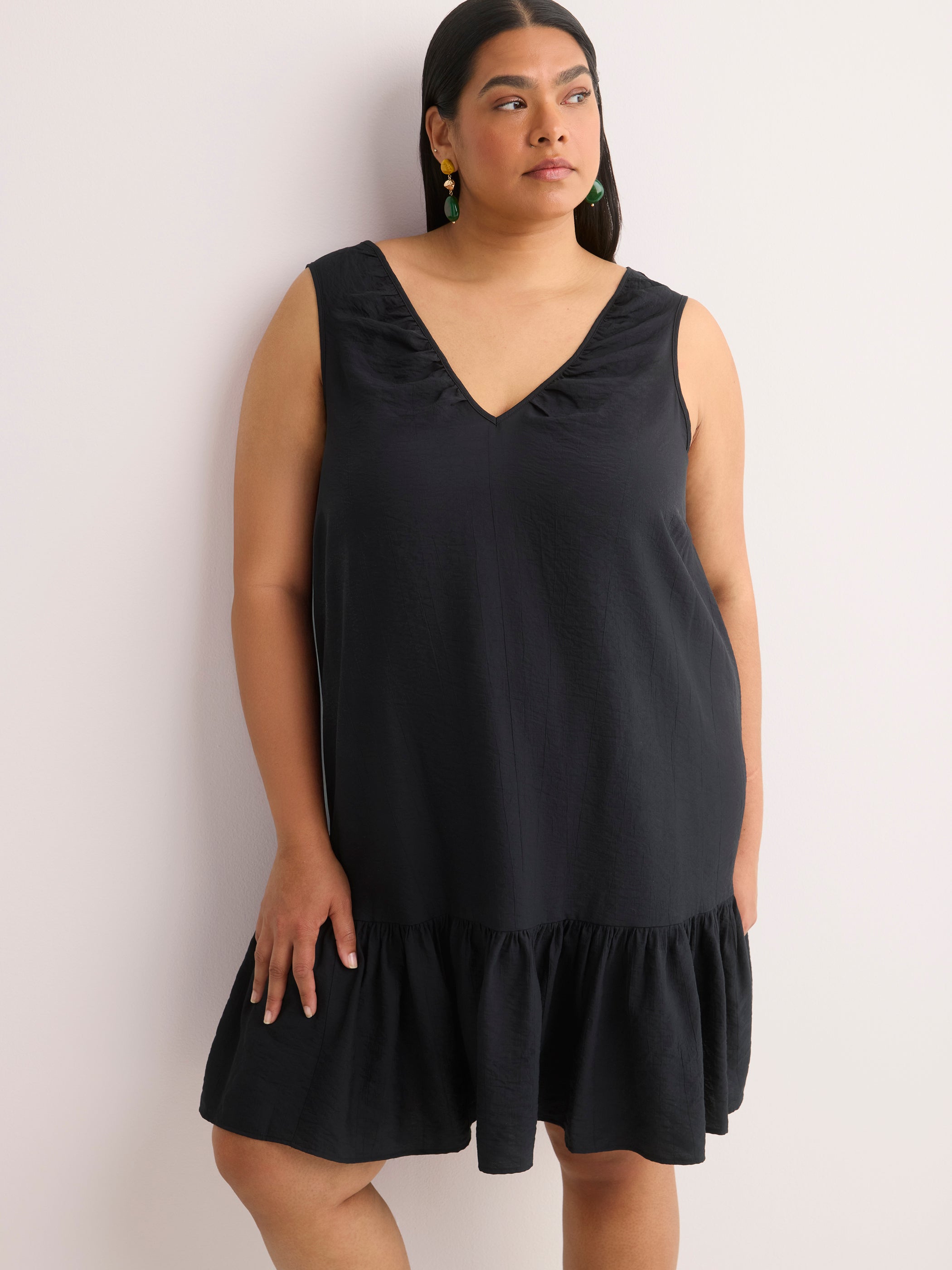 Robe évasée à enfiler sans manches avec col en V