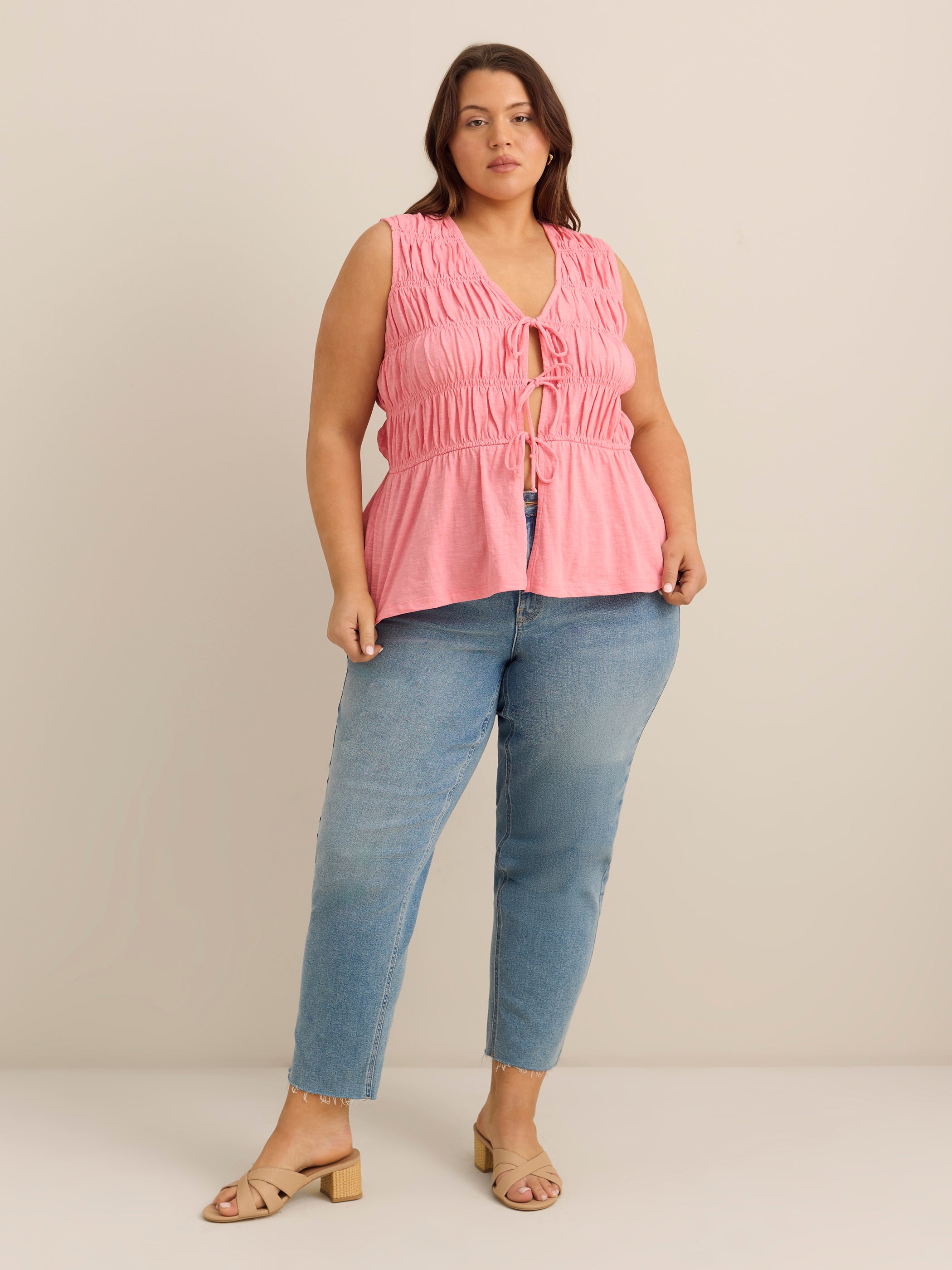 Flared Sleeveless V-Neck Tie-Front Smocked Blouse - Addition Elle