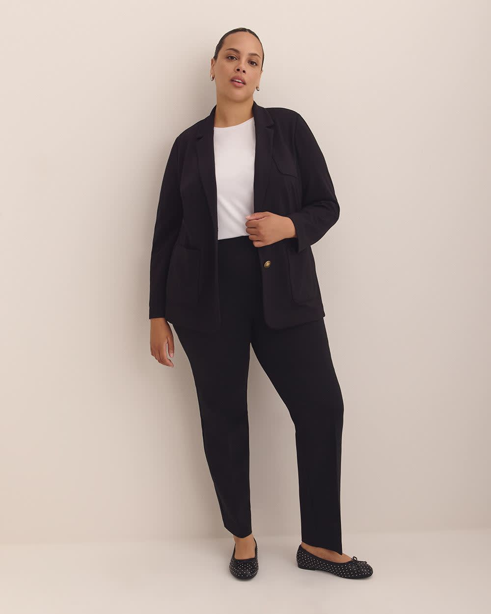 Pantalon amincissant noir à  jambe droite en pointe de Rome