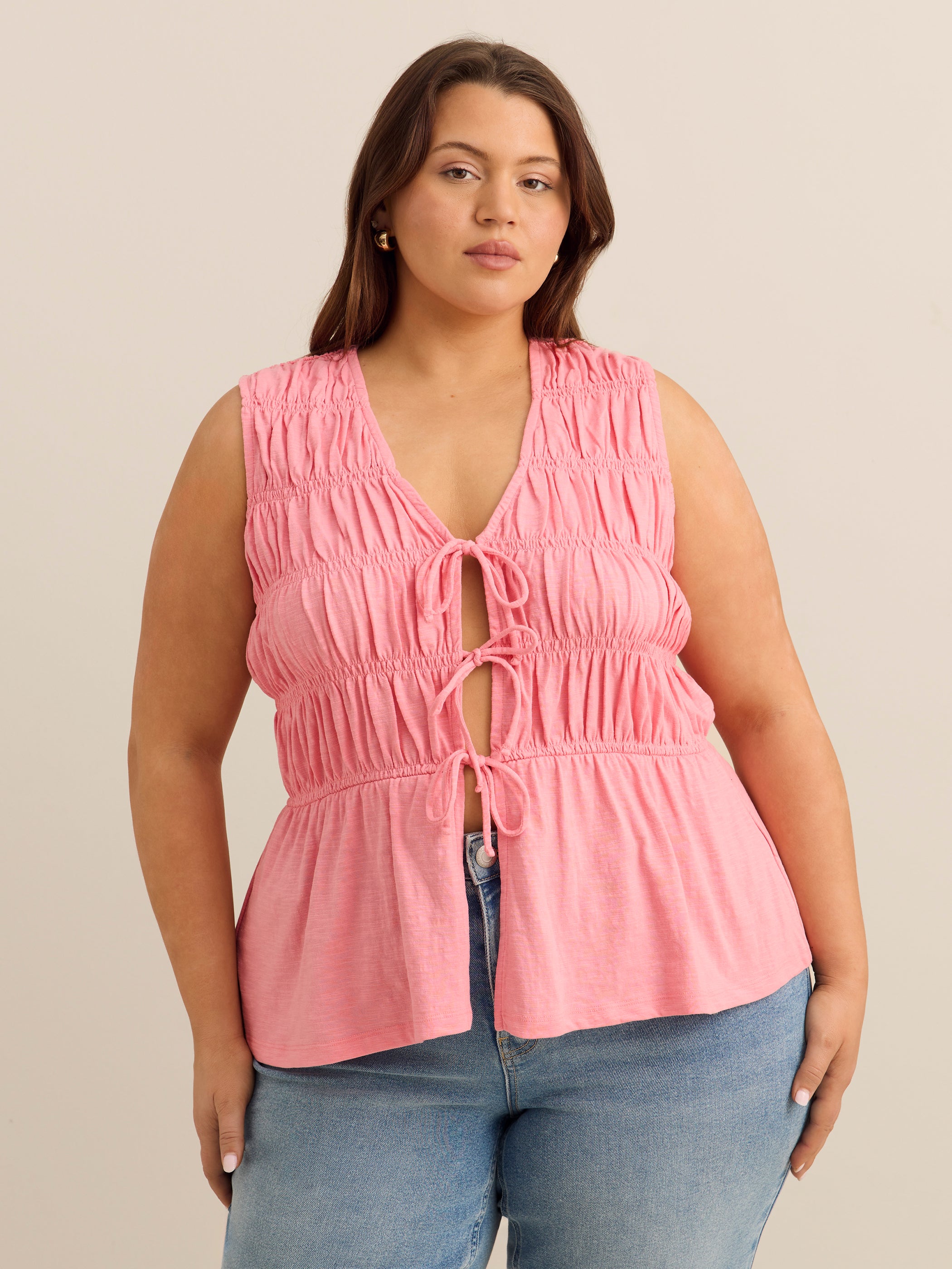 Flared Sleeveless V-Neck Tie-Front Smocked Blouse - Addition Elle