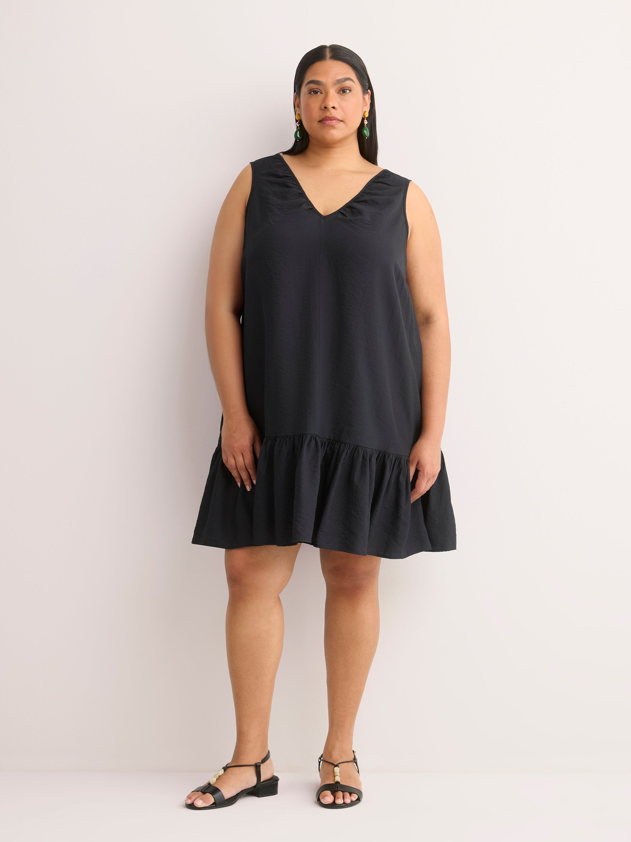 Robe évasée à enfiler sans manches avec col en V