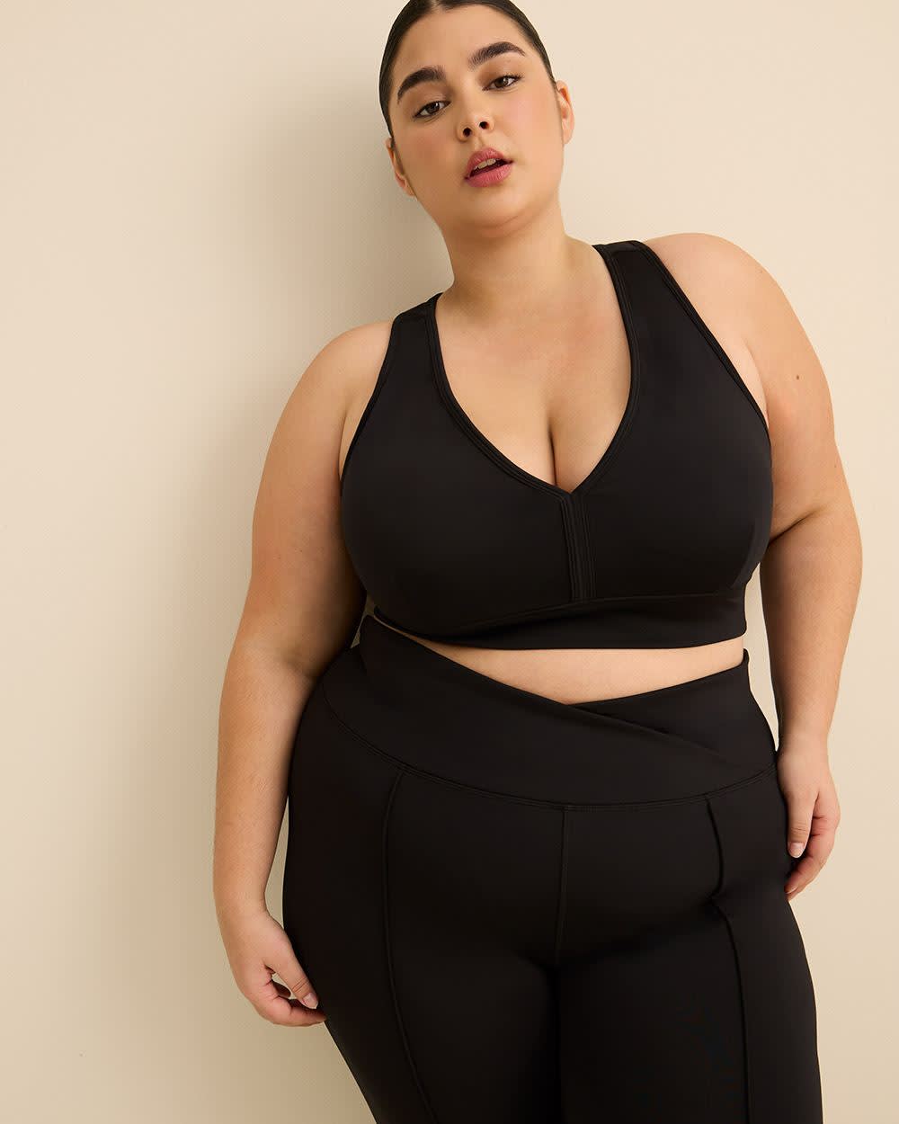 Pantalon noir à taille haute croisée et jambe évasée, tissu responsable - Active Zone