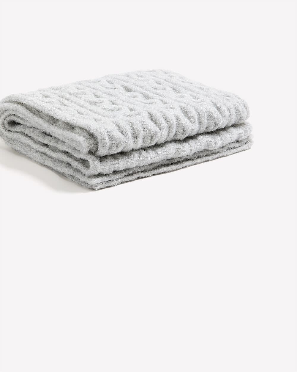 Écharpe en mailles torsadées