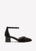 Chaussure noire pointue à  talon bloc et bride à  la cheville, pied très large
