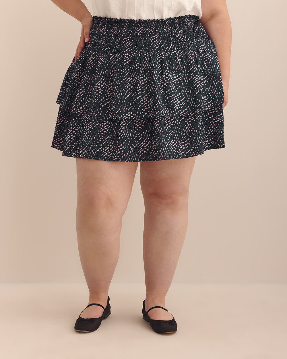 Mini-jupe étagée bleu marine à pois ondulés