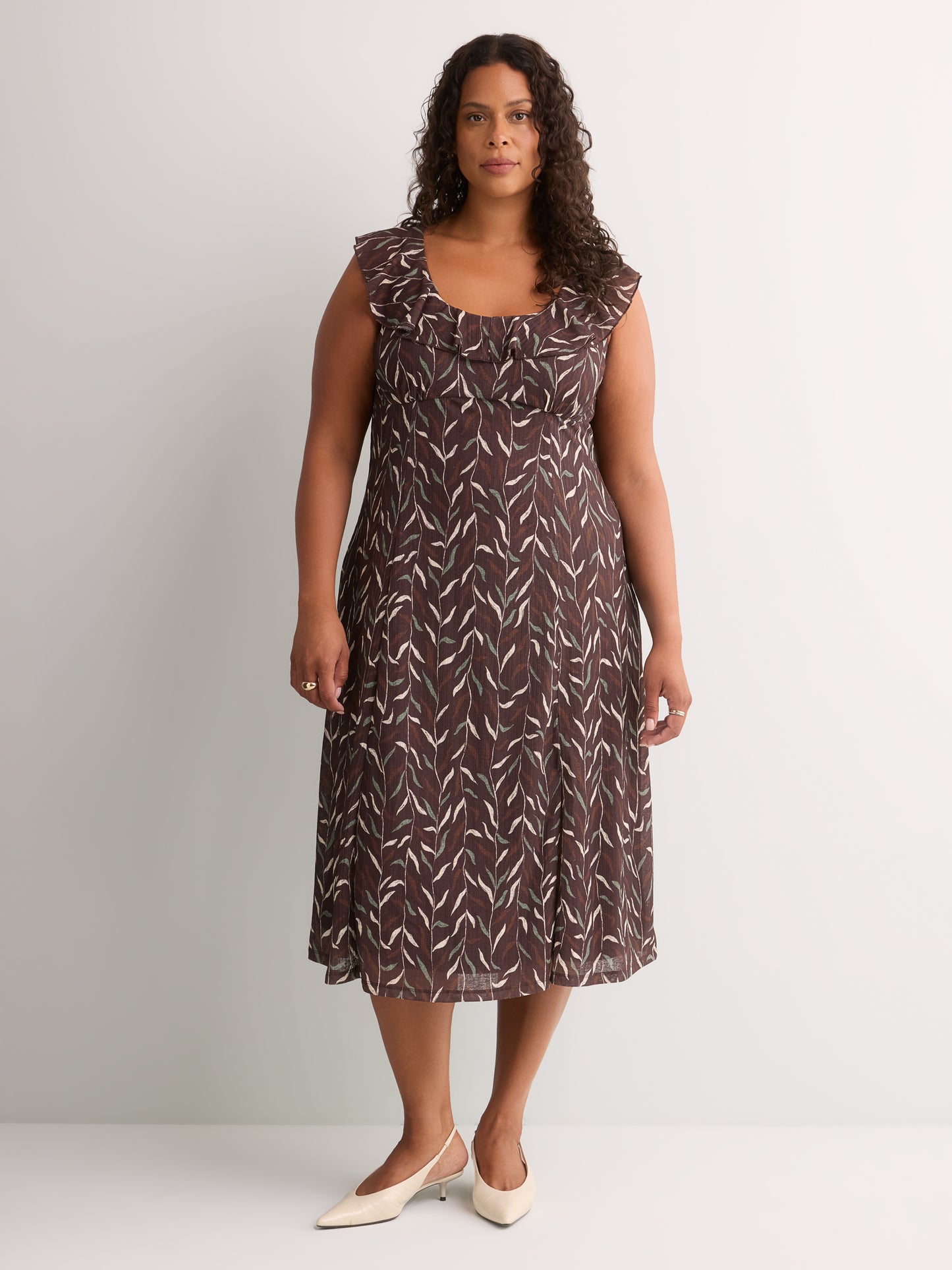 Leaf-Print Sleeveless Midi Dress with Ruffled Empire Waist - Addition Elle
