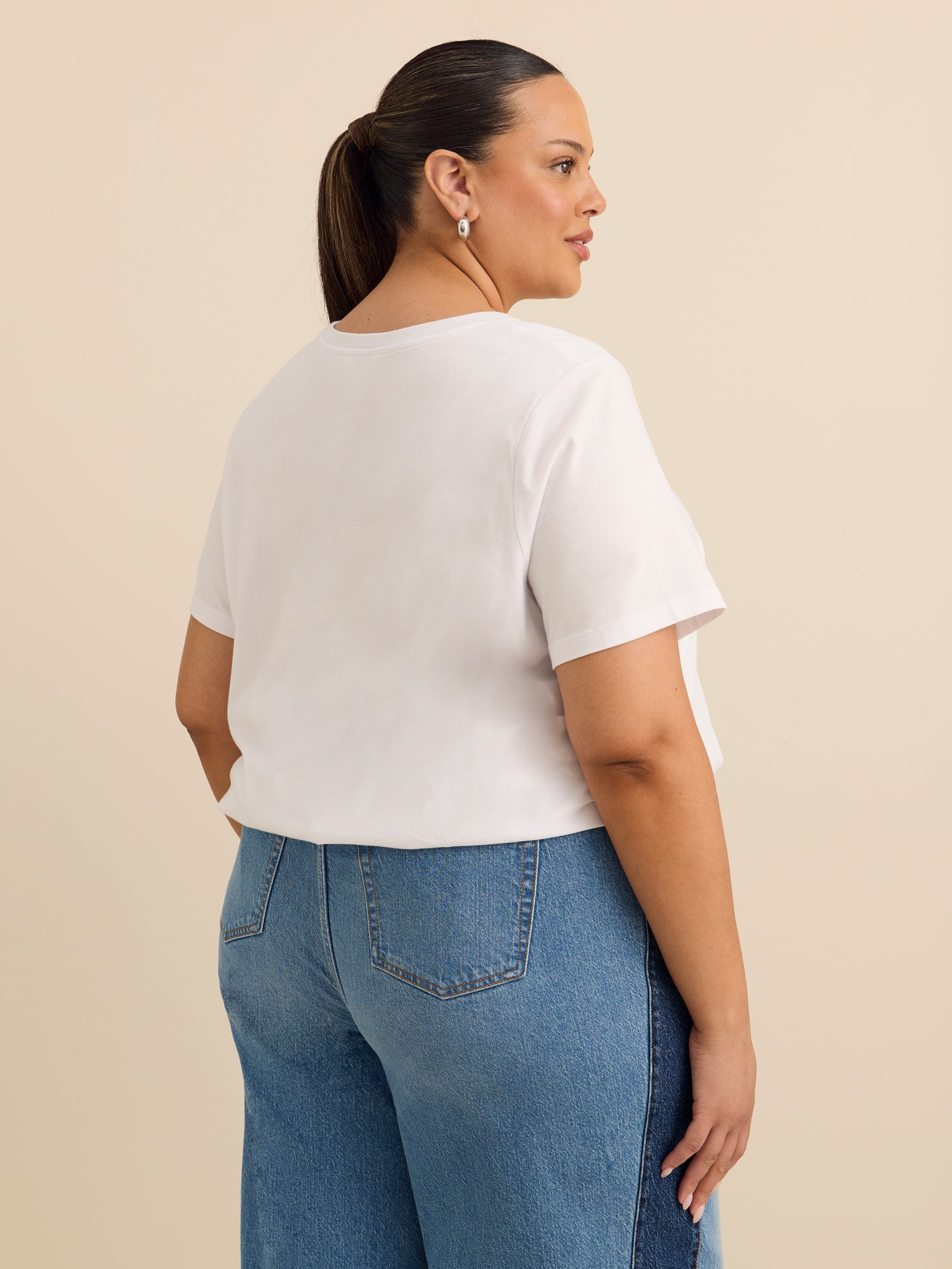 Haut à manches courtes avec ourlet bouffant