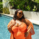 Maillot une-pièce bandeau orange à jambe échancrée