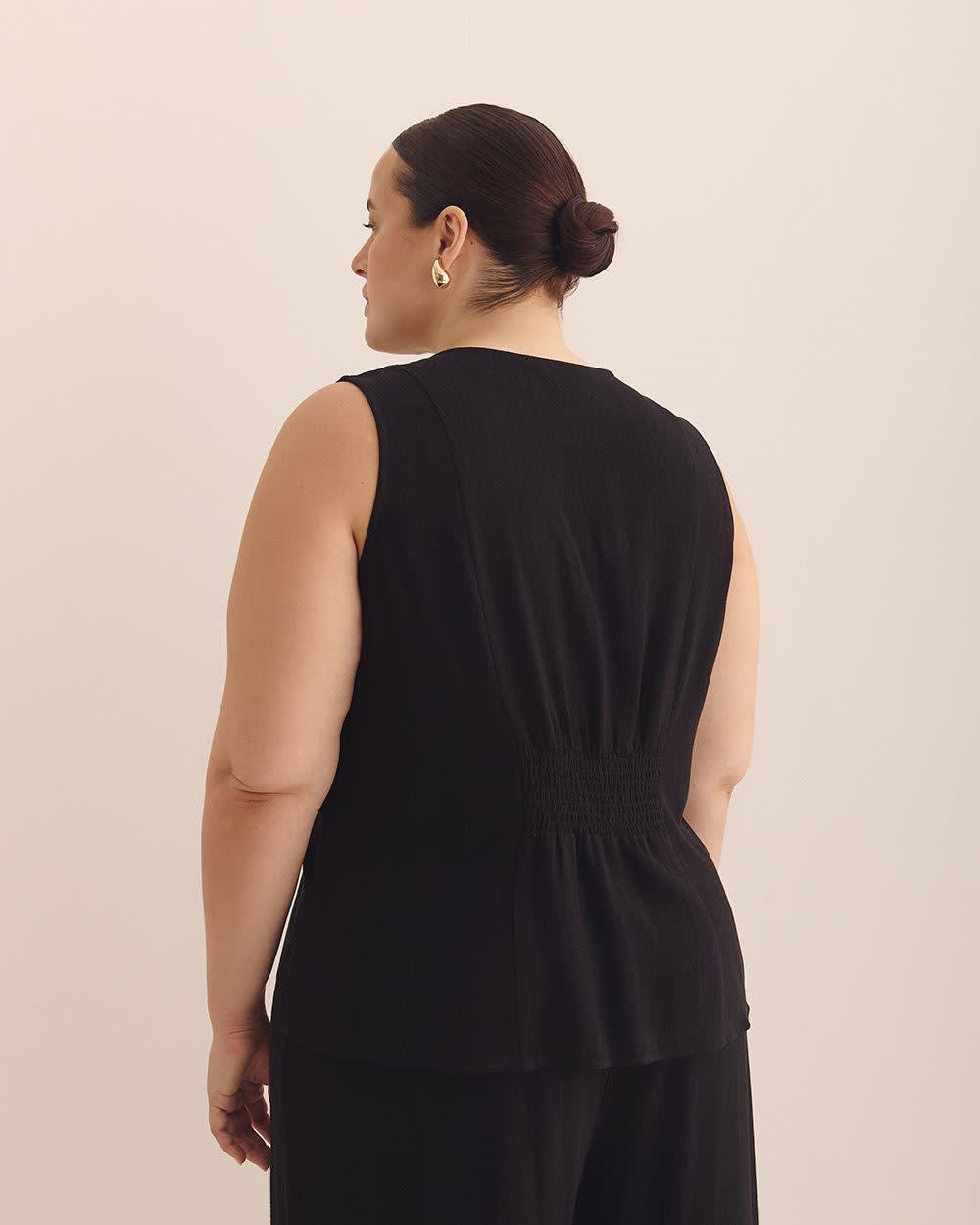 Blouse boutonnée sans manches à encolure en V