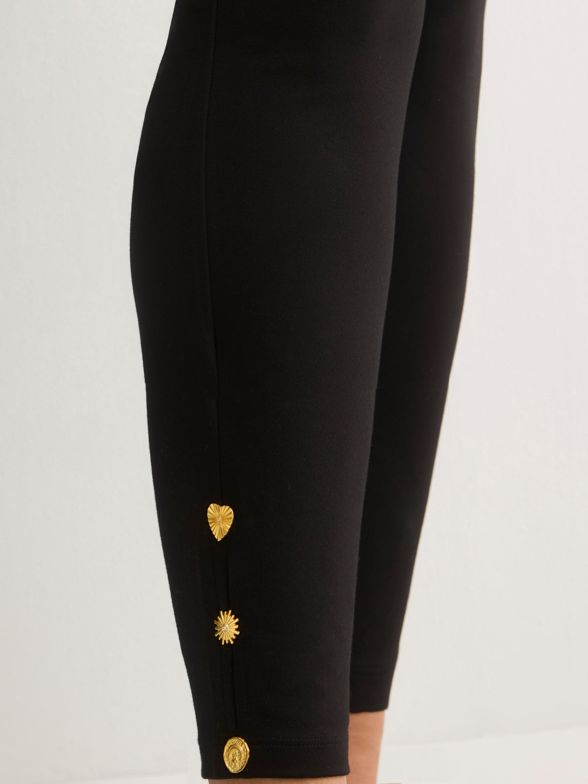 Responsible, Black Fashion Legging with Keyhole and Charm at Hem