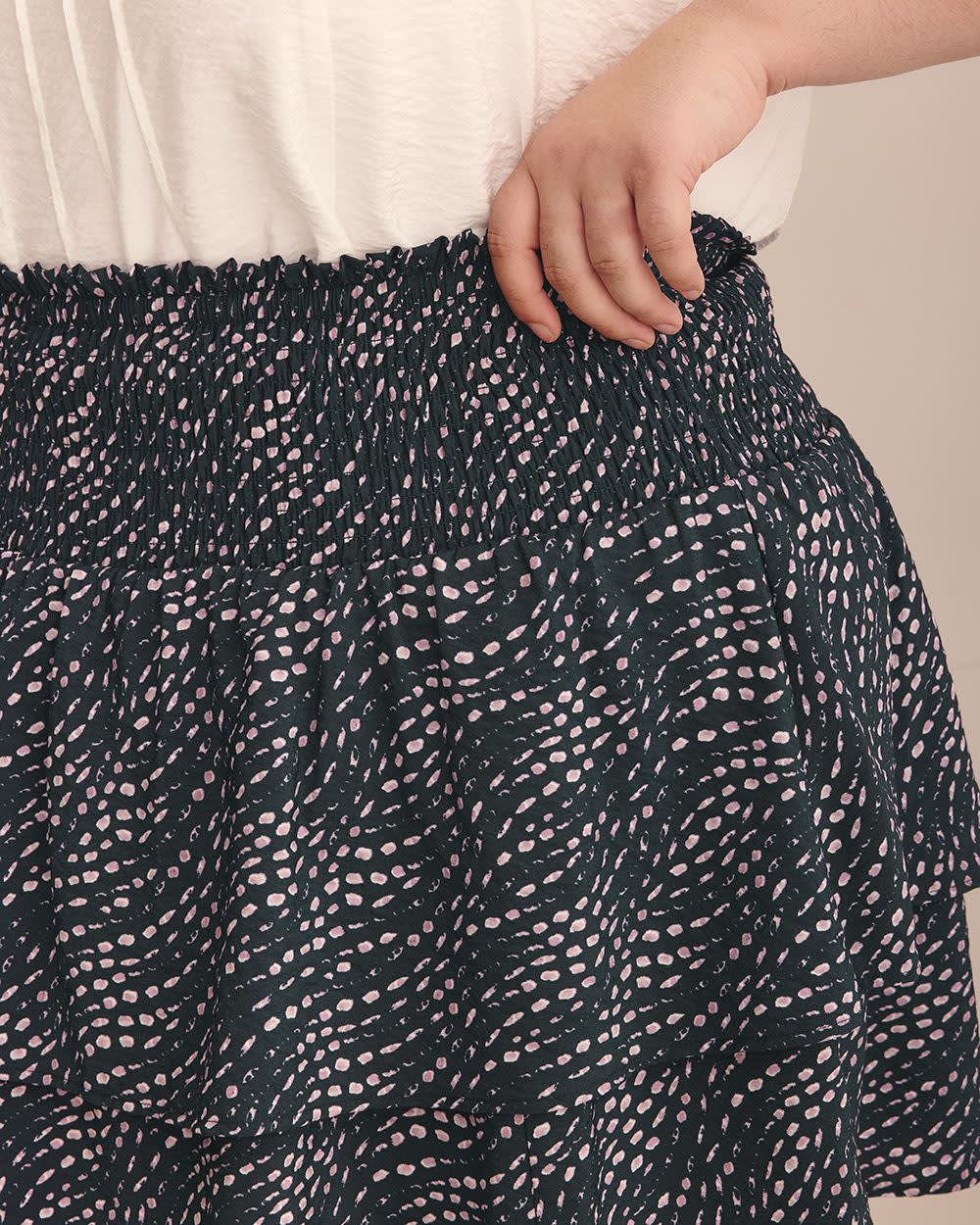 Mini-jupe étagée bleu marine à pois ondulés