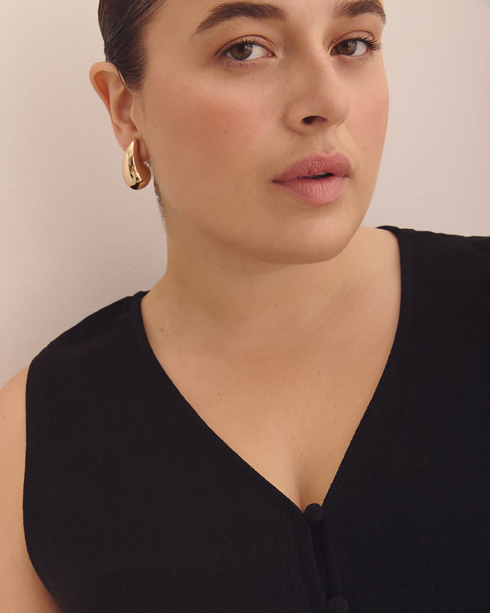 Blouse boutonnée sans manches à encolure en V