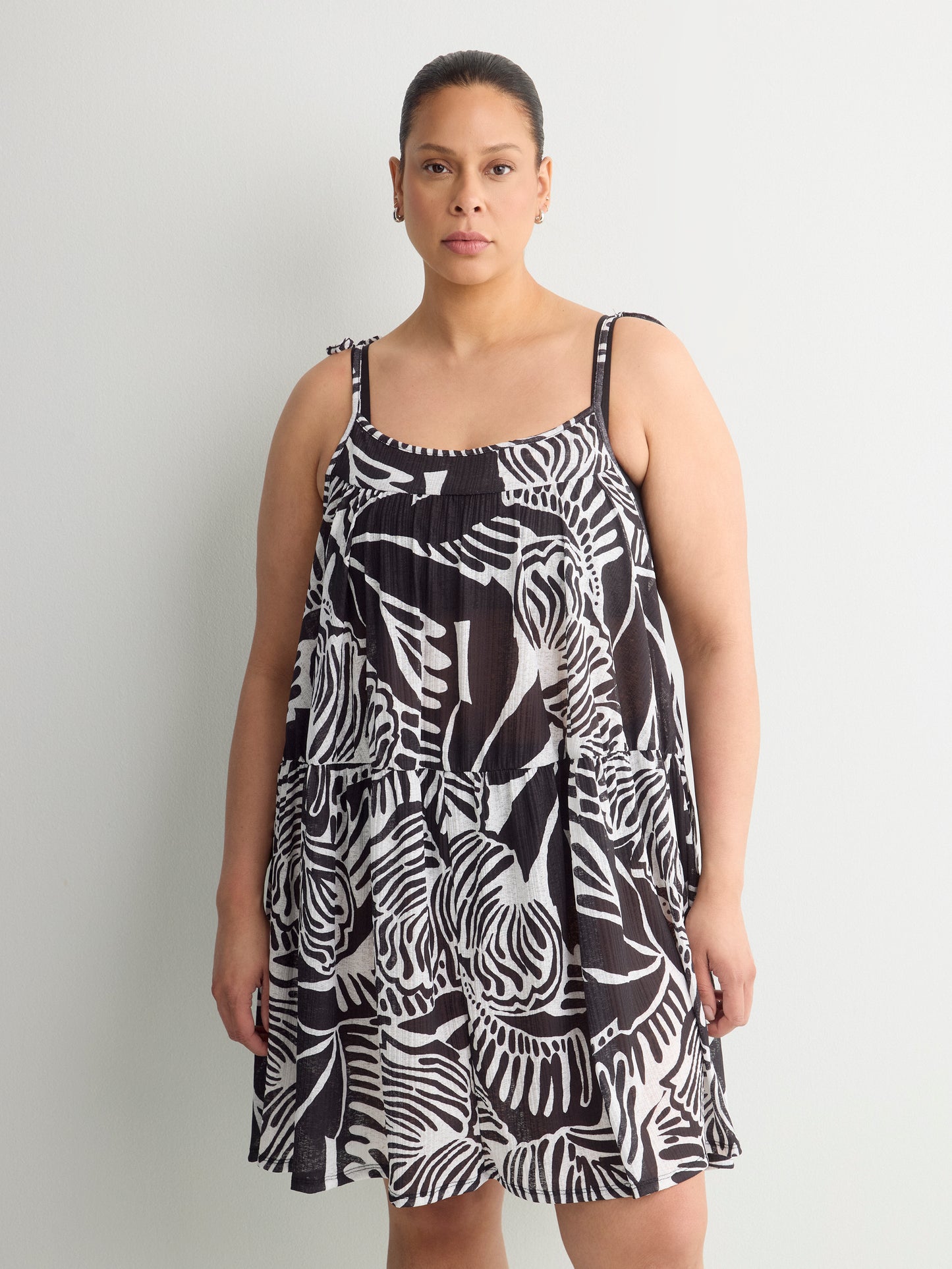 Robe cache-maillot sans manches en tricot léger plissé