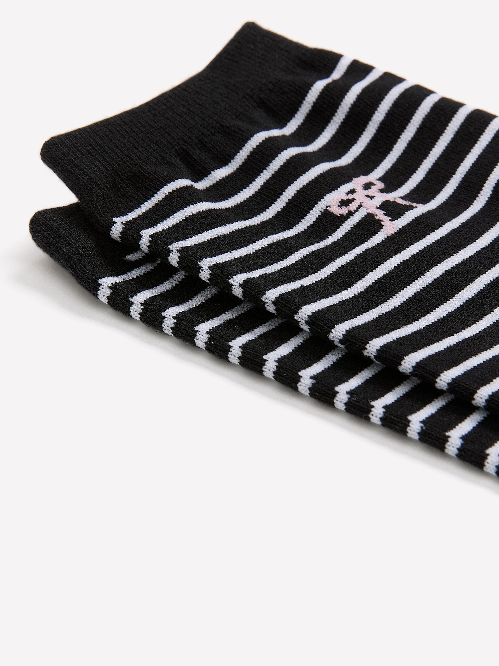 Black and White Striped Crew Socks with Bow Placement