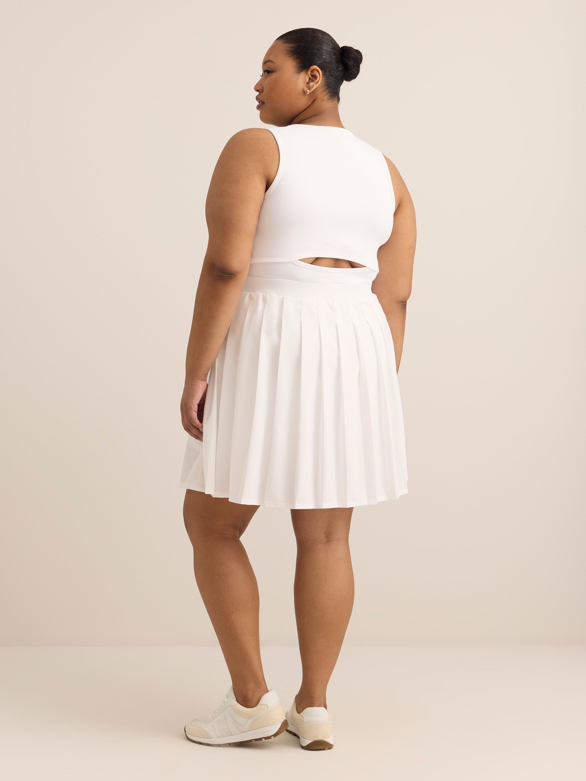 Active Zone plus size pleated tennis dress with open back – Penningtons