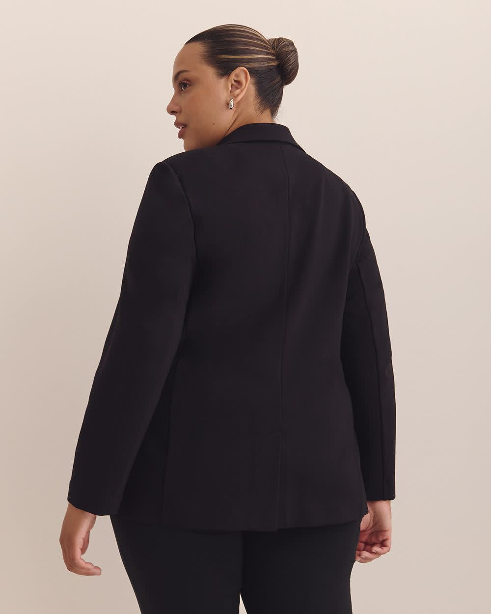 Veston noir en pointe de Rome avec col tailleur, tissu responsable