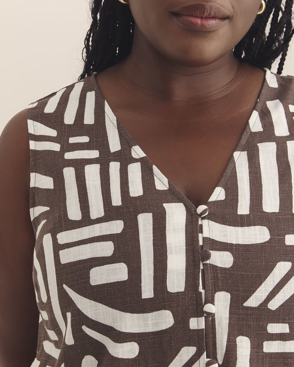 Blouse boutonnée sans manches à encolure en V