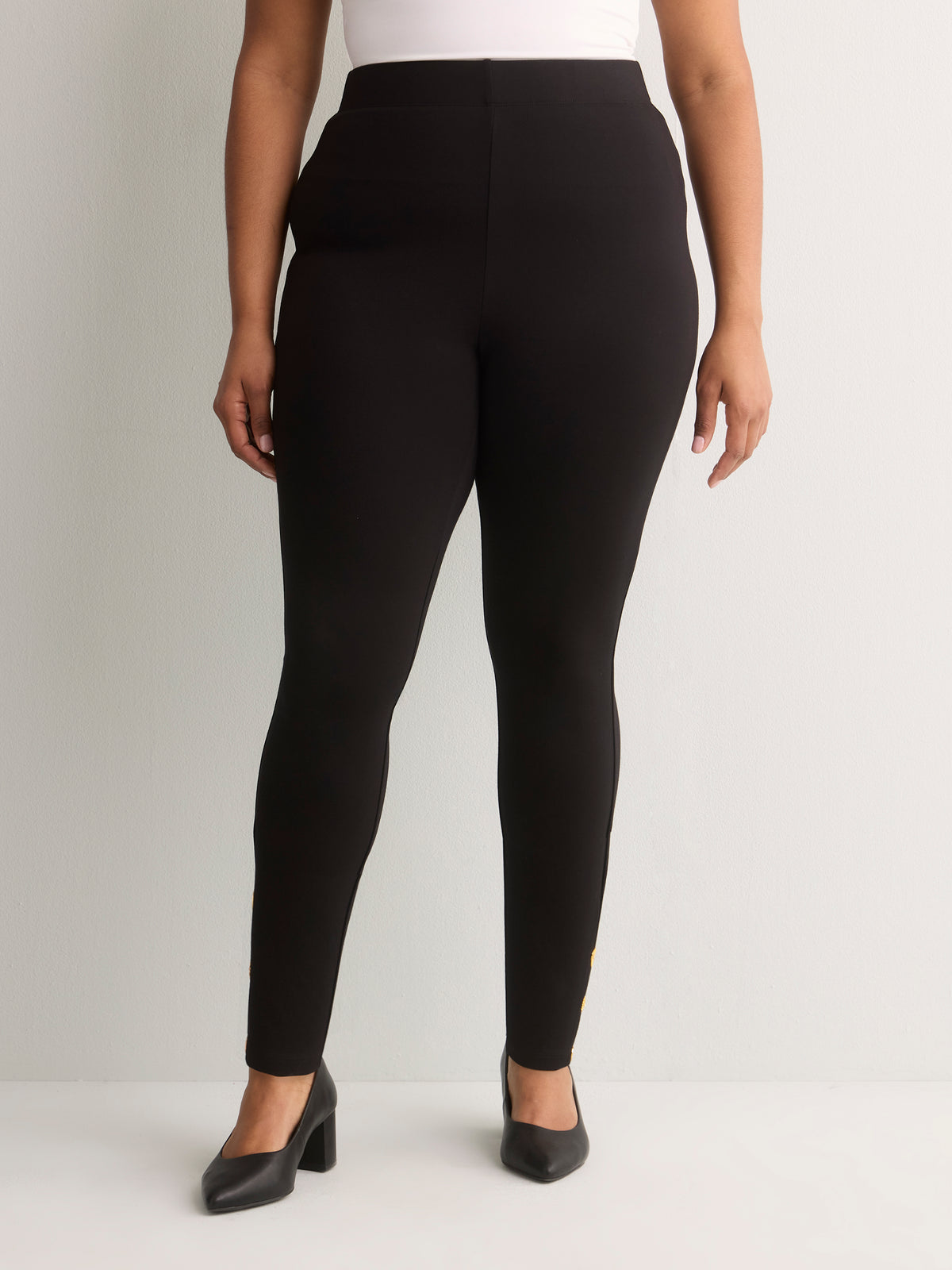 Responsible, Black Fashion Legging with Keyhole and Charm at Hem