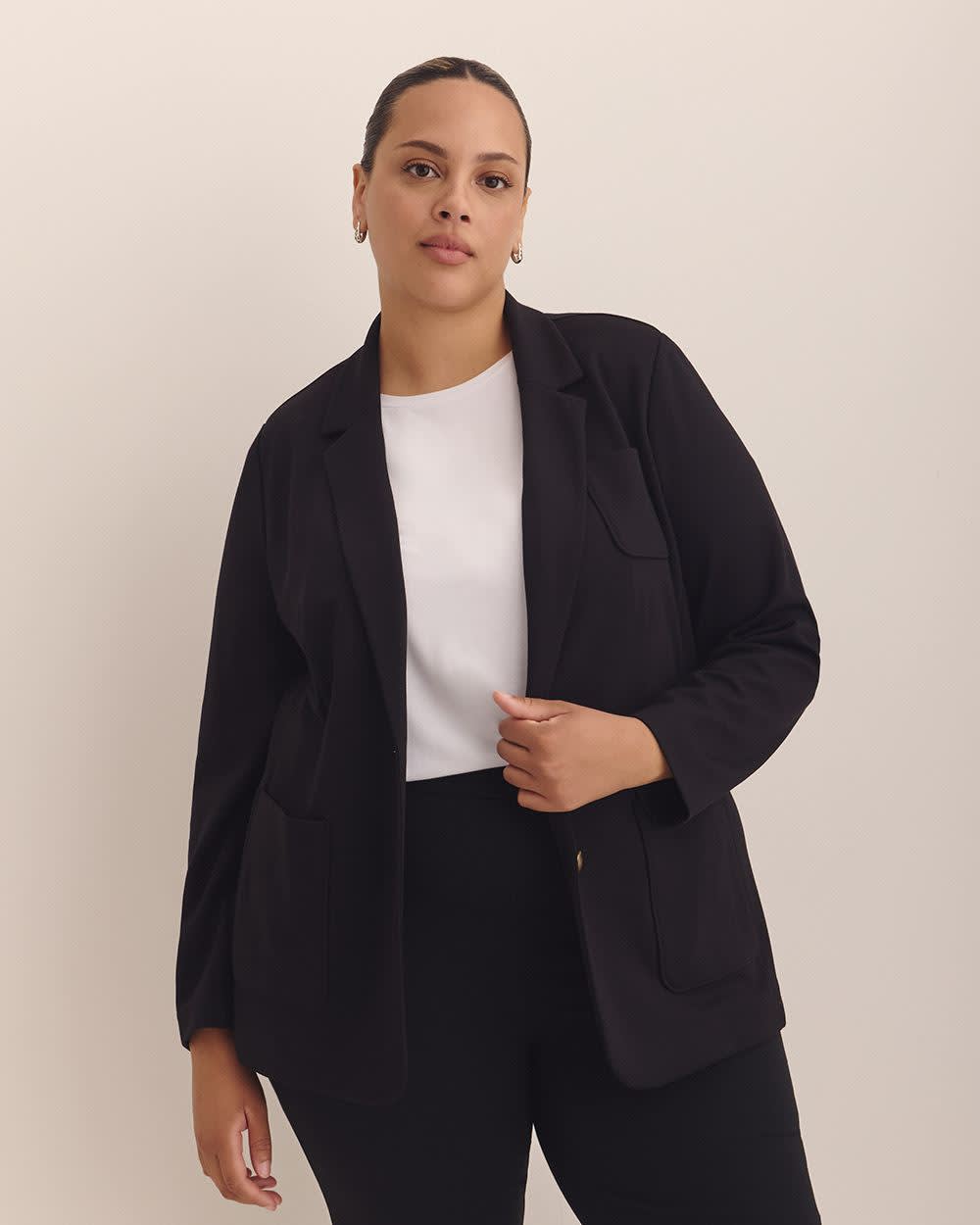 Veston noir en pointe de Rome avec col tailleur, tissu responsable