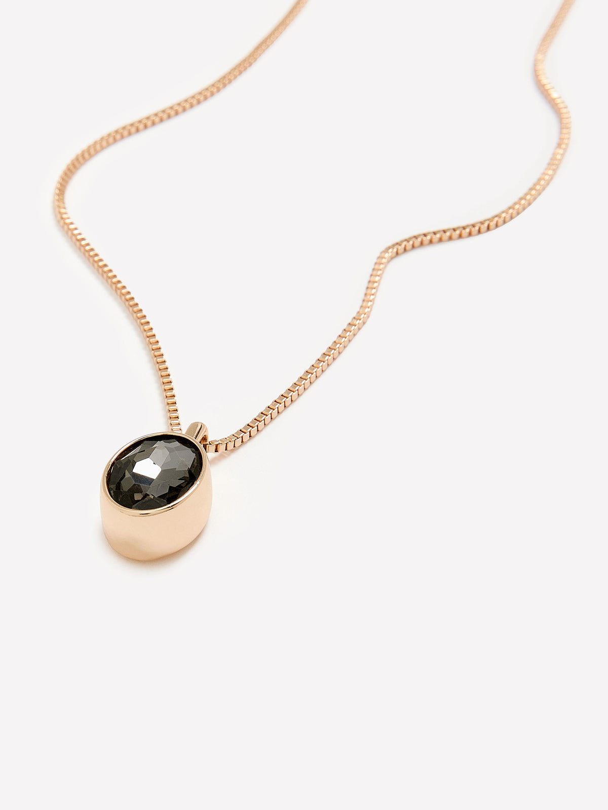 Long Golden Necklace with Shiny Stone Pendant