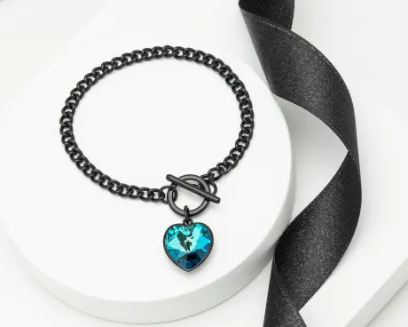 Bracelet à bascule en bronze avec breloque cœur en cristal autrichien de qualité bleu bermuda.