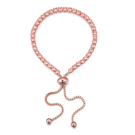 Bracelet tennis ajustable en or rose et cristaux de pêche, fabriqué avec des cristaux autrichiens de qualité.