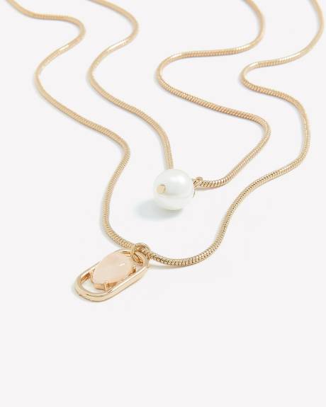 Collier court à deux chaînes avec pendentif perle et pierre