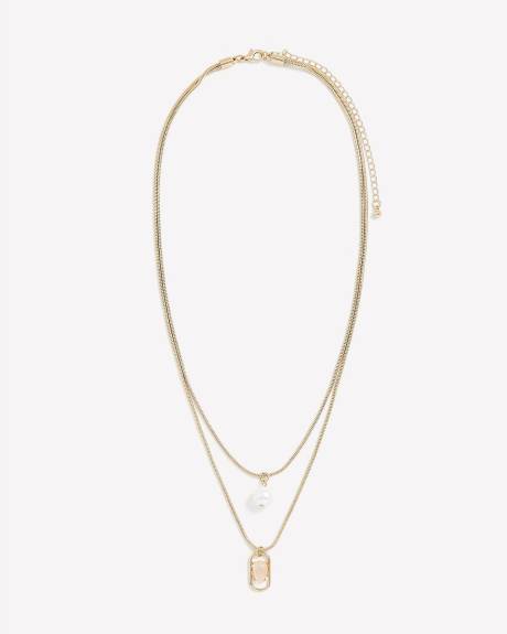 Collier court à deux chaînes avec pendentif perle et pierre