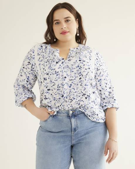 Blouse fluide fleurie à encolure fendue
