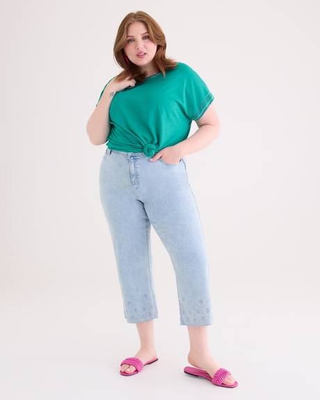 Haut long en tricot bleu avec col rond et coutures contrastantes