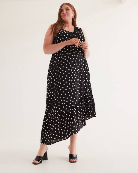 Robe longue sans manches à pois et ourlet asymétrique