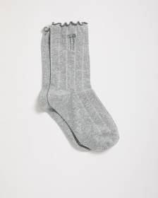 Chaussettes à rebord ondulé avec boucle brodée