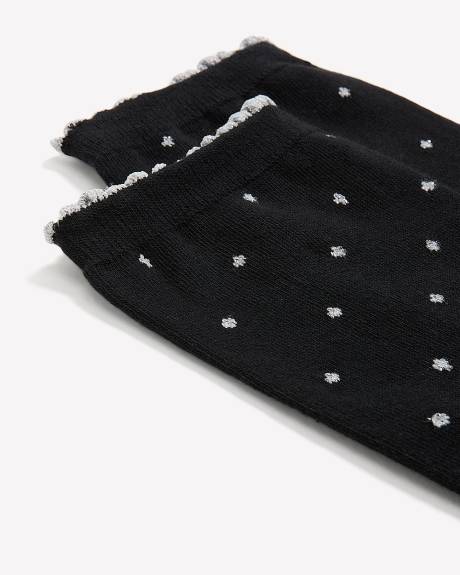 Chaussettes noires à pois métallisés et rebords festonnés Chaussettes noires à pois métallisés et rebords festonnés