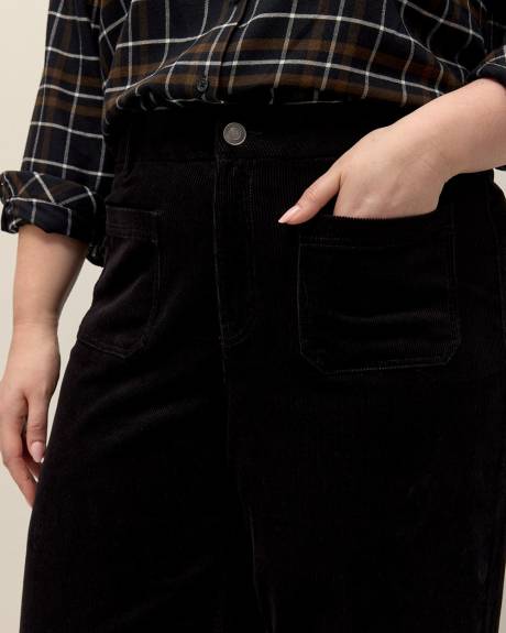 Pantalon en velours côtelé à jambe évasée, coupe galbée