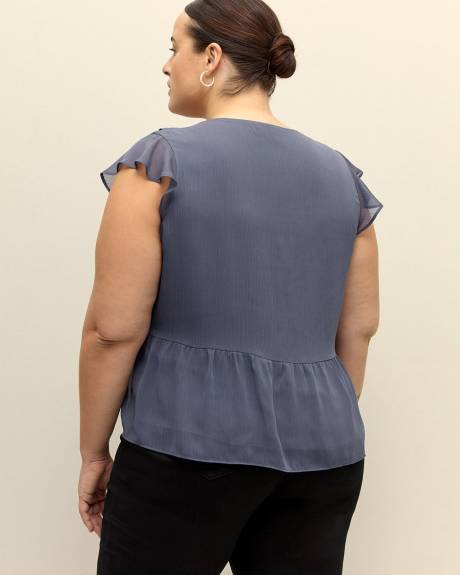 Blouse à manches courtes et col en V à volants