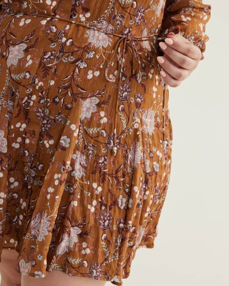 Robe boutonnée fleurie avec col chemise et jupe évasée