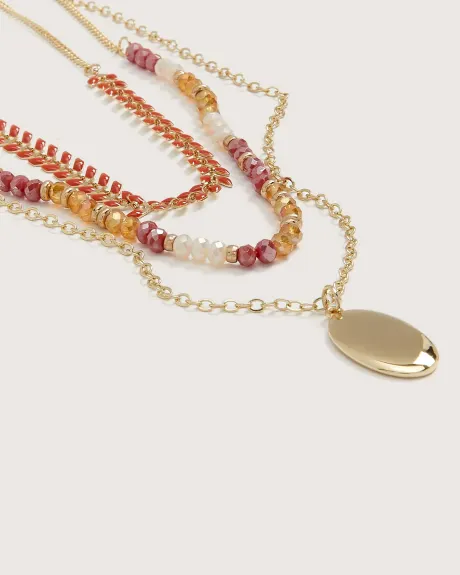 Collier à trois chaînes avec billes et pendentif médaillon