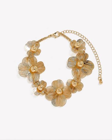 Bracelet orné de fleurs dorées en maille