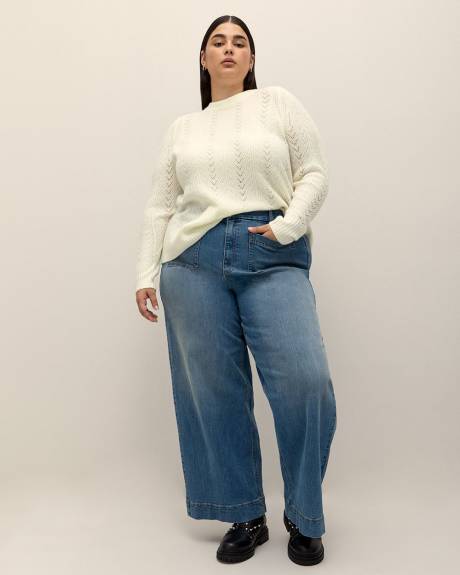 Pull à manches longues avec ouverture au dos et boucle en satin